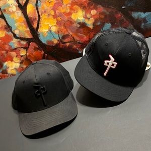 Two Yupoong hats